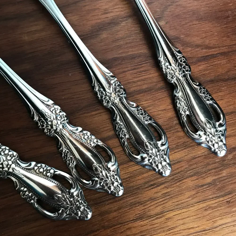Oneida RAPHAEL stainless glossy flatware - set of 4 oval place spoons